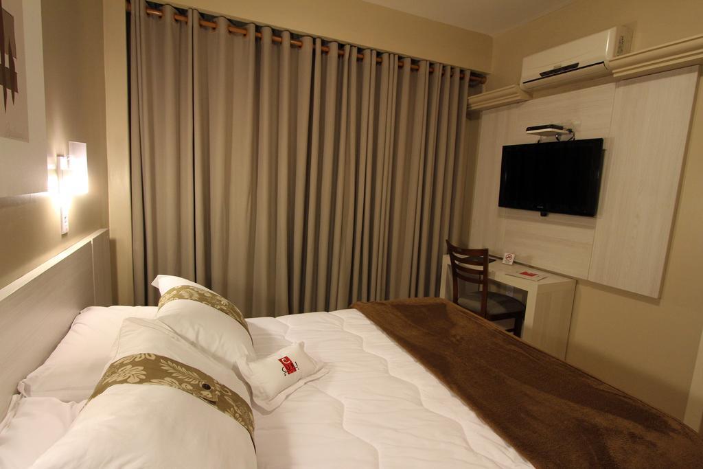 Hotel Curi Executive Pelotas Zimmer foto