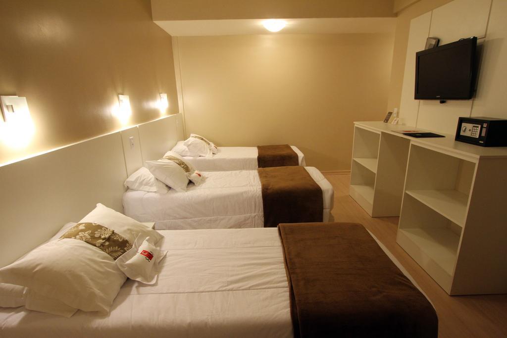 Hotel Curi Executive Pelotas Zimmer foto